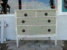 Jolie paint in farmhouse beige is a beige with subtle green undertones. This Dresser Was Repainted In Old White And A Sage Green Then Heavily Distressed With Peeks Of Re Redo Furniture Beautiful Interiors Decor Furniture Projects