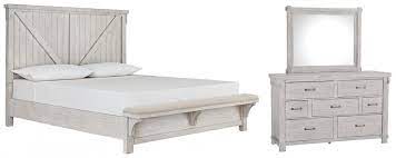 And the easy on the eyes, distressed. Brashland Queen Panel Bed With Mirrored Dresser B740 B8 B1 Bedroom Sets Price Busters Furniture