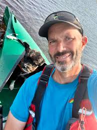 Choppy and windy clear lake paddle with dolphins