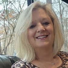 Bought a book at catholic charities and this picture was in the book. Would  like to find out who this belongs too!