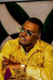 Ahimbisibwe Victor,seals the 1st hour of the #MorningAddiction with yoga by  Ray G ft Levixone powered by MTN Uganda