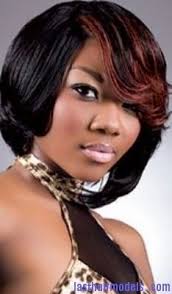 Her hair is kept short and styled to the side. Hiarstylestuff Com Bob Hairstyles Curly Bob Hairstyles Hair Styles