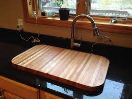 Use this attractive sink and stove burner cover bamboo cutting board to add extra counter space to any kitchen. Sink Insert Kitchen Sink Diy Sink Cover Kitchen Sink Cover