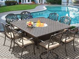 Create an intimate outdoor dining atmosphere with the square nautical trestle 37 dining table. Eli 64x64 Square Outdoor Patio 9pc Dining Set For 8 Person With Fire Table Series 7000 Atlas Antique Bronze Finish Zenpatio