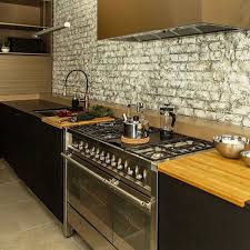 (13) — write a review. Exposed Brick Offers Rich Raw Texture To Marlino Lorenze S Refined Kitchen Design Featuring The Litze Articulating Faucet Kitchen Design Kitchen Exposed Brick