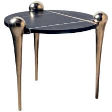 Aluminum outdoor side table with tile tabletop and umbrella hole. Petra Side Table With Sahara Noir Marble And Cast Bronze Legs For Sale At 1stdibs