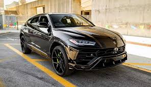 Lamborghini urus wrapped in satin white with carbon fiber. Lamborghini Urus Suv Black