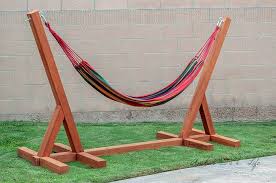 Start working on a diy hammock stand and prepare for a total relaxation for summer. Diy Hammock Stands That Would Look Perfect In Your Backyard