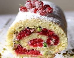 The Light Raspberry Pistachio Christmas Log With Mascarpone Is A Log Composed Of A Sponge Cake Topped With Mascarpo Yule Log Cake Yule Log Cake Recipe Desserts