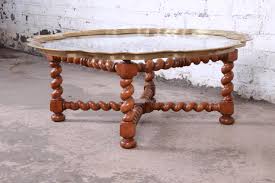 Elegant yet livable, the fiori is inviting with its glossy finish, turned balusters and rustic travertine stone table top. Baker Furniture English Barley Twist Oak Brass And Glass Cocktail Table For Sale At 1stdibs