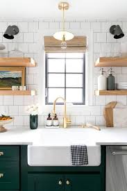 A 1930s Fixer Upper Gets A Modern Renovation Domino Interior Design Kitchen Modern Farmhouse Kitchens Green Kitchen Cabinets