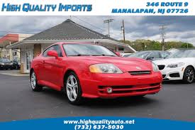 Image result for Triton Green 2004 Tiburon