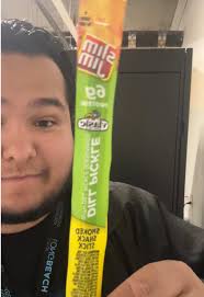 Picke with Slim Jim inside with Honey and Tajin