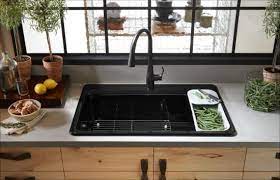 I don't know how to remove handle and bell housing. Kohler K 596 Bl Simplice Single Hole Kitchen Build Com