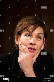 German actress Christiane Paul sits onstage during a reading of Norwegian  writer Sara Johnsen's new book 'White Man' at the Lit.Cologne, in Cologne,  Germany, 13 March 2013. The literature festival runs until