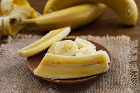 Of the filling onto a dough circle, fold it in half, and then if you're going to boil the dumplings, seal it by pinching along the curved edge. Cut Lengthwise And Crosswise Ripe Banana Peeled Stock Photo Picture And Royalty Free Image Image 110512169