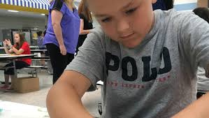 Wilbur Elementary School students create their own society, currency