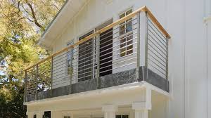 A sturdy wooden bar top will comfortably fit plates and glasses. Top 10 Considerations For Balconies And Balcony Railings Agsstainless Com