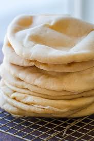 You'll find my homemade pitta bread recipe below, i made 12 pittas so that i could stock the when i was researching how to make pitta breads i found and read many recipes from all over the place. Pita Bread Recipe Oven Or Stovetop Natashaskitchen Com