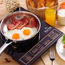 12 High Tech Kitchen Gadgets That Will Elevate Your Cooking Induction Cooktop Hot Plates Cooktop