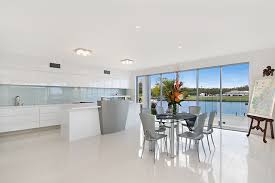 Natural stone wall tile on black & white kitchen. Kitchen Modern Floor Tiles Novocom Top
