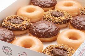 Krispy kreme is the name of an international chain of doughnut shops that was made by vernon rudolph in 1937. Snickers Krispy Kreme Doughnuts Are Here