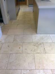 holes in travertine cleaned, filled and
