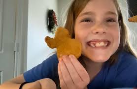 It's TEXAS. Where our kids eat chicken nuggets shaped like our state.  Gracie is about to bite into the panhandle 😂 #TexasForever  #afterschoolsnacks #girlmom #TexasHumor