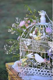 At j&s hobbies and crafts we have a wide assortment of scrapbook paper pads, card stock, trims, laces, embellishments, paper flowers, ephemera, read more Flowers In Birdcage More Ideas For Flowers For Center Pieces Bird Cage Decor Decorative Bird Houses Bird Cage Candle