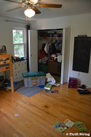 Mess in kids room, messy empty child bedroom interior with unmade bed and scattered toys on carpet. Before After My Boys Green Bedroom Makeover