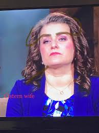 Robin Brown is getting a fat roll neck