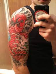 Half sleeve tattoo is a collection of many small tattoos that cover at least half of a person's arm from the shoulder to the elbow. 30 Unique Koi Fish Tattoo Designs Creativefan Sleeve Tattoos Half Sleeve Tattoos Designs Half Sleeve Tattoo