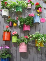Recycled Cans And Little Bit Paint So Colorful And Cute Great Idea For A Little Herb Garden Cute Garden Ideas Vintage Garden Decor Garden Projects
