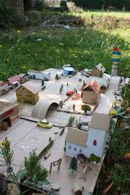40 Incredible Examples Of Cardboard City Art Bored Art Cardboard City Art For Kids Cardboard Crafts