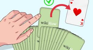 Hold out the deck and ask the audience member to insert her card face down into the middle. How To Do The Jumping Card Trick 6 Steps With Pictures