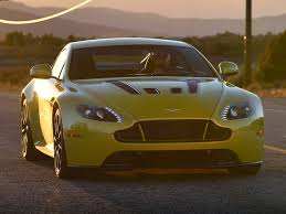 Image result for Sunburst Yellow 2017 Aston Martin