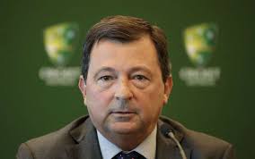 James Sutherland gives a thumbs-up sign to reporters after announcing his  decision to step down as Cricket Australia CEO