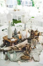 The utensils and dinner plates should all be at level. 54 Amazing Beach Wedding Centerpieces Weddingomania