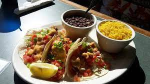 Place a handful of chopped red cabbage on the bottom of each tortilla. Fish Taco Picture Of Hurricane Hole Restaurant Marina Key West Tripadvisor