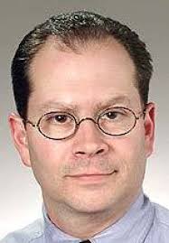 Oral surgeon claims firing was retaliation