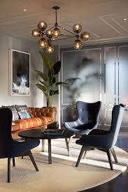 How To Elevate Your Living Room Decor With A Mid Century Lamp Www Livingroomideas Eu Livingroomidea Hospital Interior Design Interior Design Modern Interior
