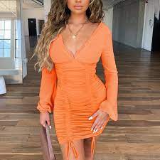 Check out our latest collection of affordable women clothing to elevate your outfit. Short Orange Long Sleeve Ruched Dress Fashion Trendy Shop