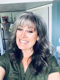 It's 1979 and I love my Farrah Faucet Flip hair style.