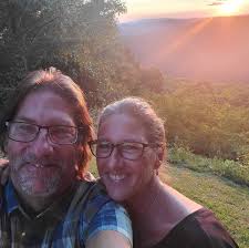 Repairing hairline cracks in tiled shower?