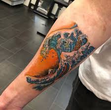 One of the most popular japanese wave tattoos is inspired by the famous painting, the great wave off kanagawa by traditional japanese artist katsushika hokusai. My Second Ever Tattoo The Great Wave Of Kanagawa By Alex At Rude Studios Leeds Tattoos