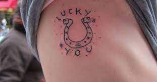 A horseshoe tattoo turned upwards will symbolize good luck and protection. Ignorant Style Lucky You Horseshoe Tattoo On Scarlett