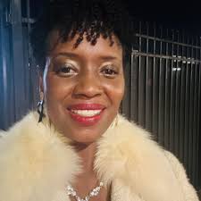 Who can design a logo and business cards for a photography business?