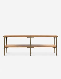 Metal holds a mirrored tabletop, crafting a functional hub for keys and everyday entryway items. Junipero Low Console Table Low Console Table Simple Console Table Console Furniture