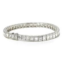 The formula behind cartier's longevity lies in its pioneering nature; Cartier Platinum Emerald Cut Diamond Riviere Tennis Bracelet Com1322 Second Hand Jewellery