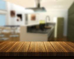 Qu'il soit brut ou teinté, vintage ou plus actuel, le bois ne nous laisse jamais de marbre et s'accommode de tous les styles. 3d Rendent D Une Table En Bois Avec Une Cuisine En Arriere Plan Photo Gratuite
